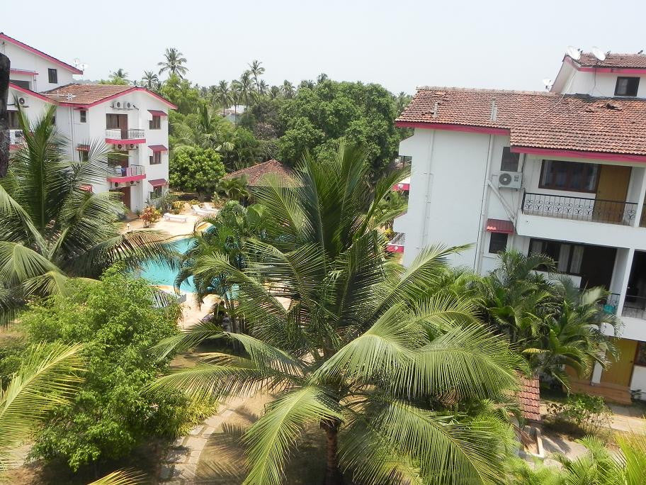 Stay at Holiday Apartments Baga (Goa): Fully Furnished 1BHK/2BHK AC Holiday Apartments, Swimming pool, Modern kitchen with all necessary cooking appliances & More!